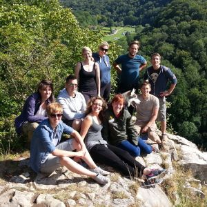 A group sat on Seven Sisters Rocks on a guided walk