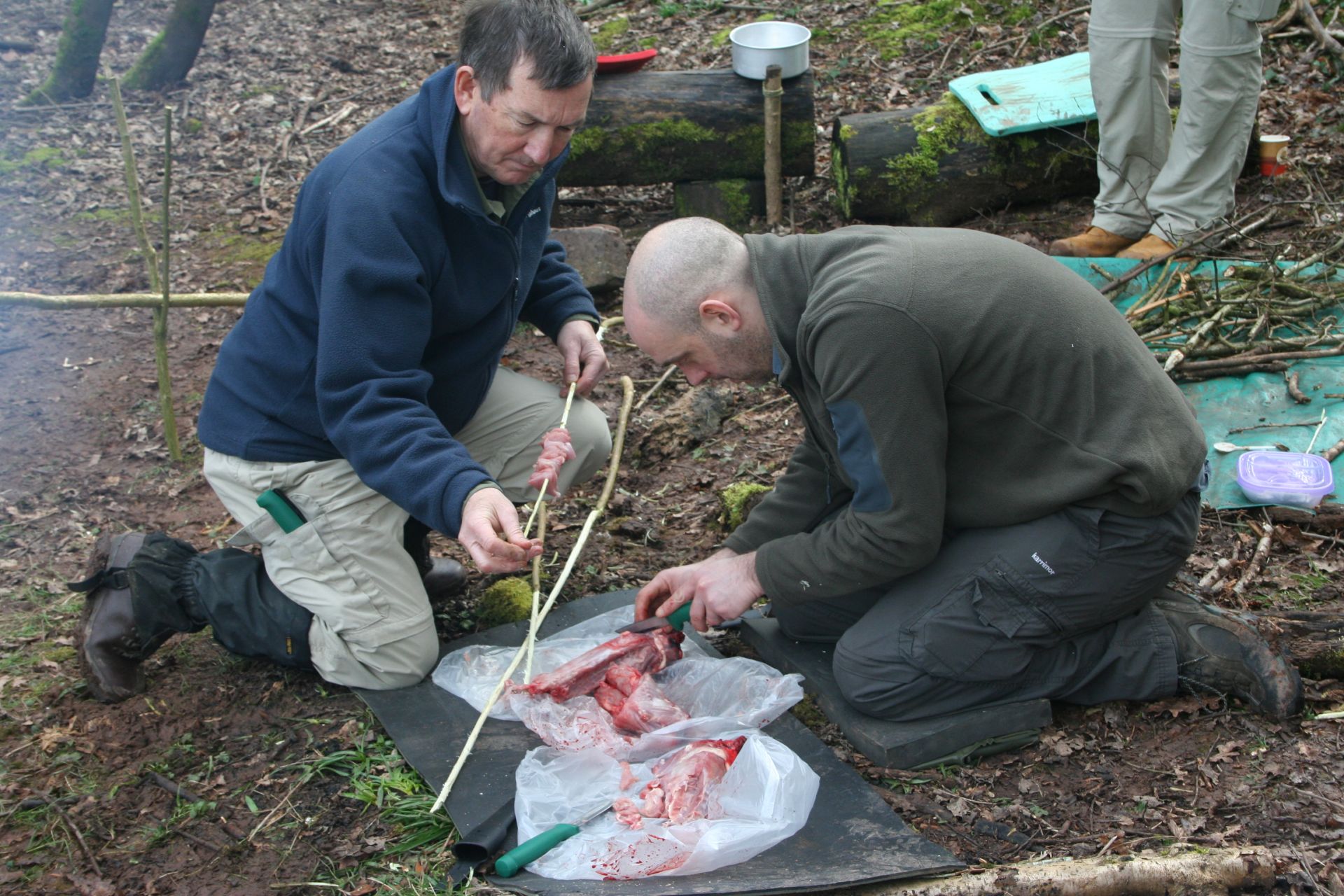 Preping the rabbits for the pot on a Bushcraft Session.